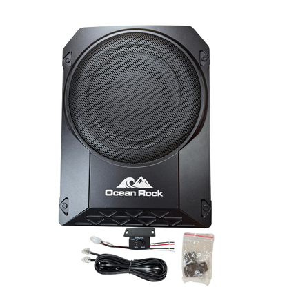 Car subwoofer with accessories on a white background, featuring the Ocean Rock brand.