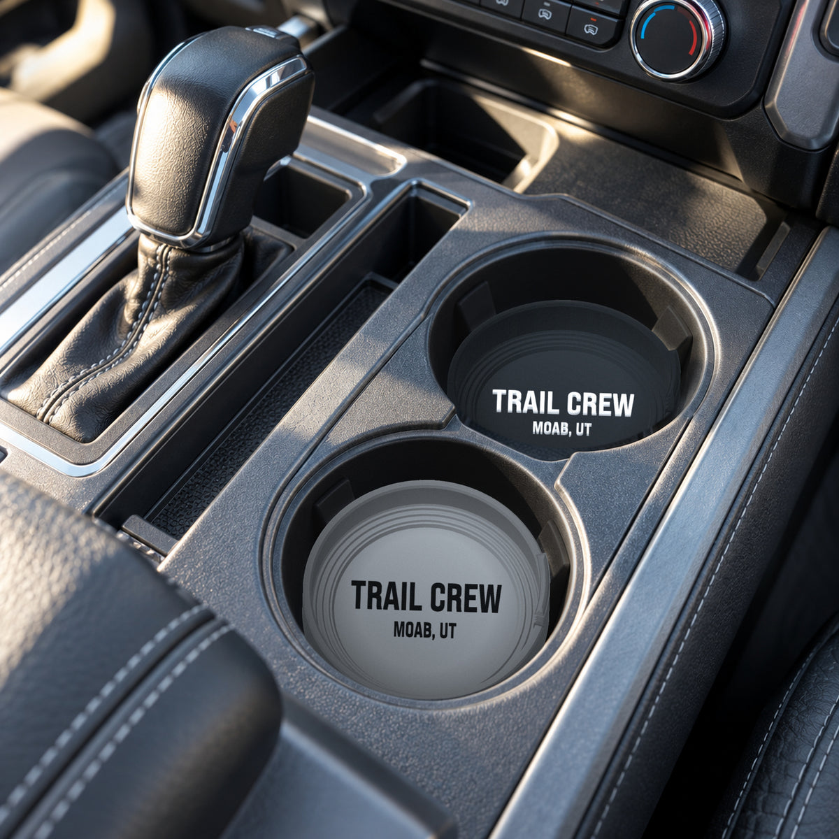 Boat name cup holder coaster in a truck center console cup holder